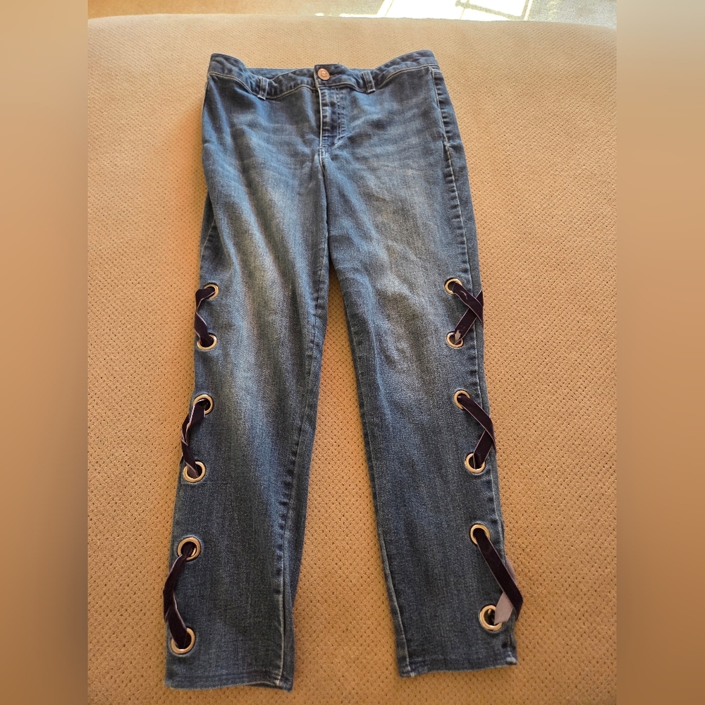 One5one Jeans women's size 12 button fly closure and lace trim on the sides.
